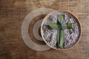 Ash wednesday, crucifix made of ash, dust as christian religion. Lent beginning photo