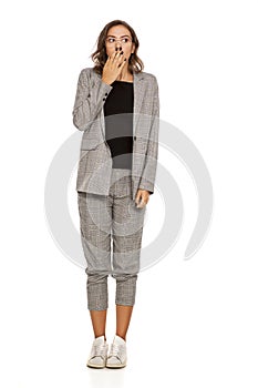 Ashamed woman in casual suit