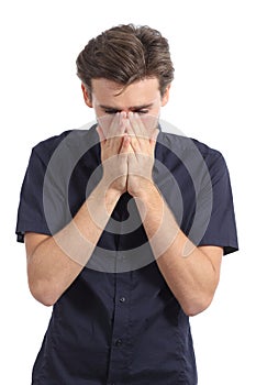 Ashamed or worried man covering mouth with his hands