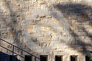 Ashlar pattern limestone brick wall texture background photo