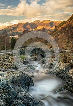 Ashness Bridge evening with golden light over Skiddaw