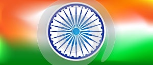 Ashoka wheel on blurred gradient tricolor india flag background photo