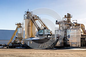 Ashphalt plant sits idle waiting for workers. Calgary Alberta Canada photo