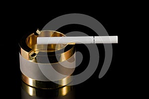 Ashtray and cigarette