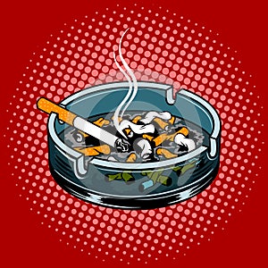 Ashtray with cigarette butts pop art style vector photo