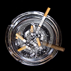 Ashtray with cigarettes and tobacco