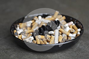 Ashtray Full Of Cigarette Butts