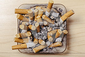 Ashtray full of cigarette butts