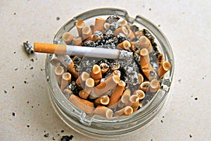 Ashtray full off cigarettes