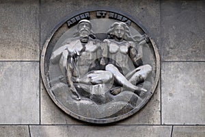 Ashur and Ninfa. Stone relief at the building of the Faculte de Medicine Paris