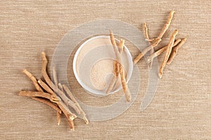 Ashwagandha supplement. Root and powder.