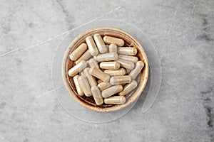 Ashwagandha Withania somnifera capsules. Concept for a healthy dietary supplementation.