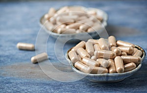 Ashwagandha Withania somnifera and Korean Ginseng capsules. Concept for a healthy dietary supplementation