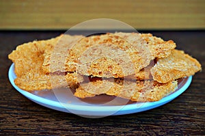 Closeup of Rice CracKer with Flossy Pork photo