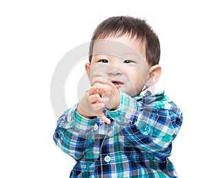 Asia baby boy clapping hand