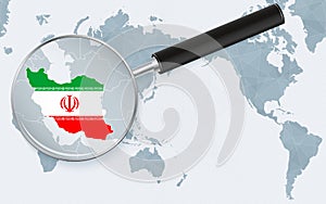 Asia centered world map with magnified glass on Iran. Focus on map of Iran on Pacific-centric World Map