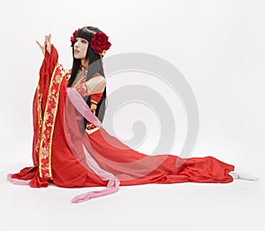 Asia Chinese style girl in red traditional dress dancer