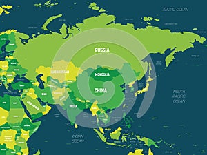 Asia - green hue colored on dark background. High detailed political map of asian continent with country, capital, ocean