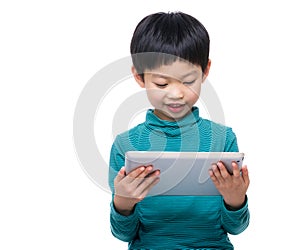 Asia little boy using tablet