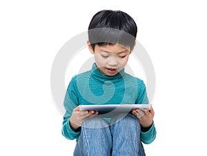 Asia little boy using tablet