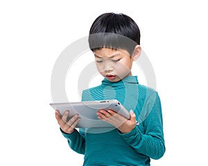 Asia little boy using tablet