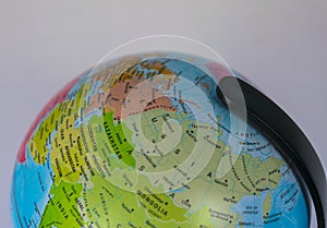 Asia map on a globe with white background.