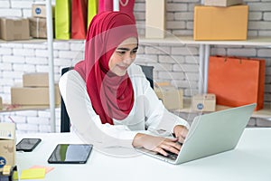 Asia Muslim women who work in modern offices.