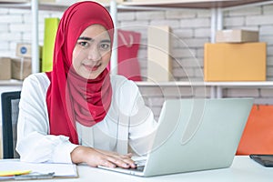 Asia Muslim women who work in modern offices.