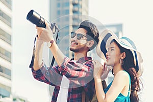 Asia people tourist man and women sightseeing city with map.