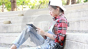 Asia thai china student university beautiful girl using her tablet