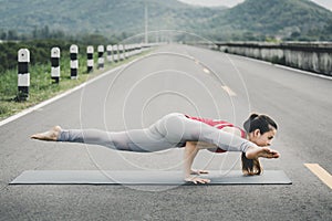 Asia woman doing yoga fitness exercise