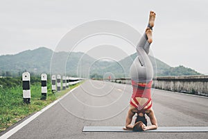 Asia woman doing yoga fitness exercise