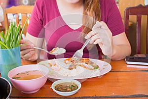 Asia woman eat thai food