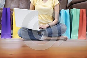 Asia woman shopping online at home.