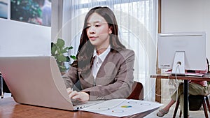 Asia woman use notebook female hands keyboarding laptop using texting pointing networking