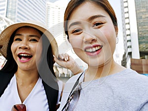 Asia women selfie and traveling in holiday long weekend in the city.