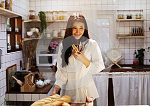 Asia young woman smile portrait and cooking food in home.