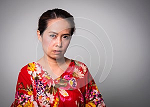 Asian adult woman straight face on white background