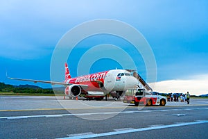 A322 Asian airline passenger plane boarding passengers stairway. At the airport on the island of Langkawi