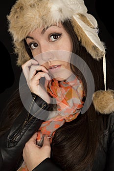 Asian American girl wearing winter clothes looking forward into