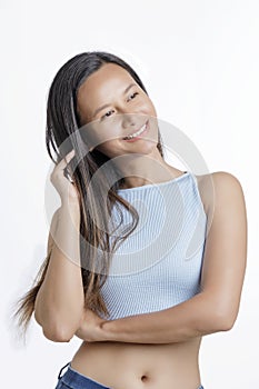 Asian American Woman showing emotions of happyness photo