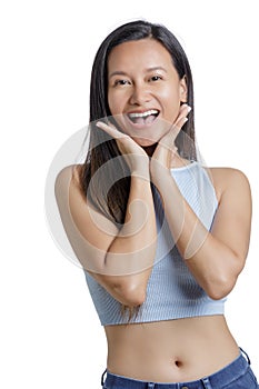 Asian American Woman showing emotions of happyness photo