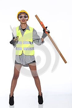 Asian Architect Engineer woman in yellow hard hat, safety vast