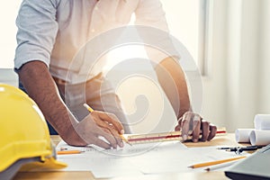 Asian architect man Standing working.