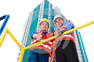 Asian architect and supervisor on construction site