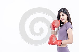 Asian attractive woman Wearing red boxing gloves, is good shape