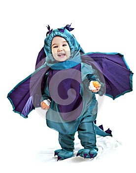 Asian baby boy in a dragon fancy dress