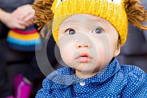 Asian baby boy feeling sad