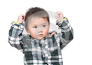Asian baby boy thinking
