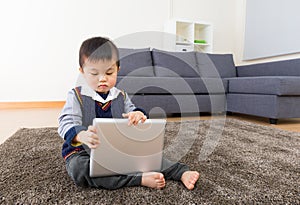 Asian baby boy using tablet